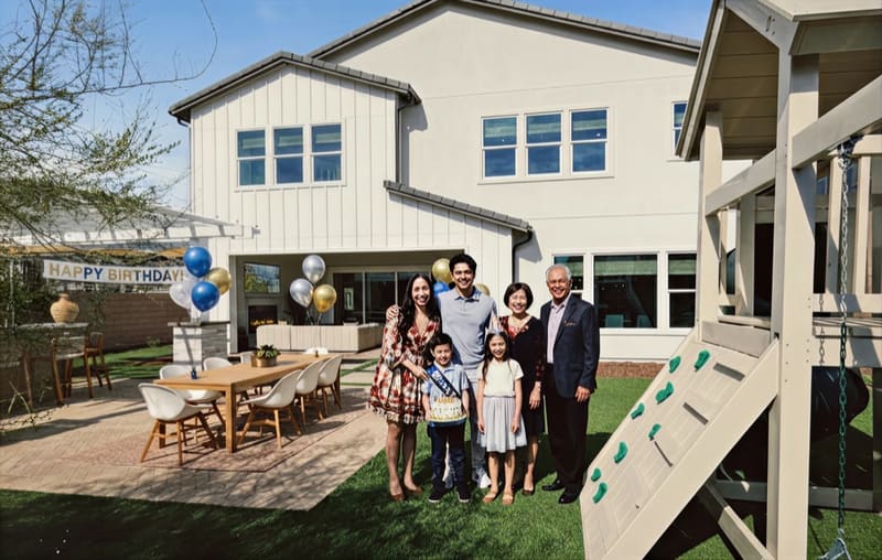 Family gathered on a patio celebrating Kyle's 6th birthday